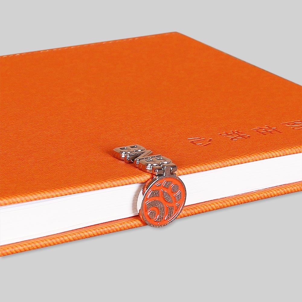 PU Notebooks With a Metal Logo